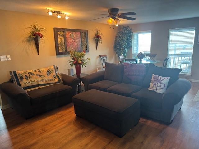 living room not bad but dark needs updated lighting