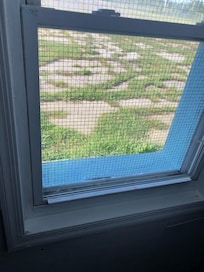 Window view of Open Field inside the room.