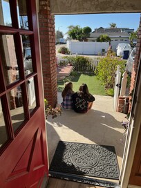 The cousins were sad to leave, saying goodbye on the front porch.