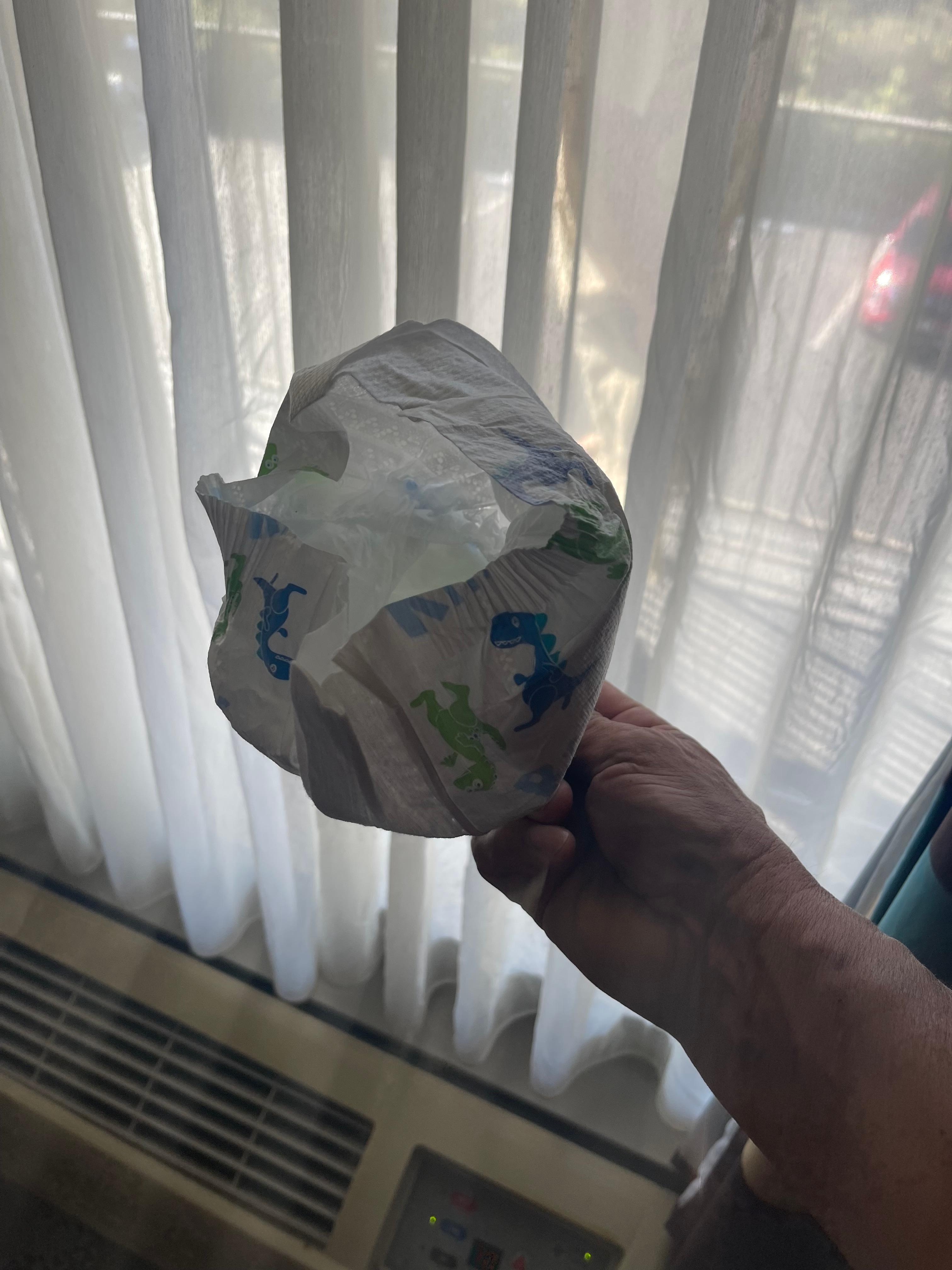 Diaper found in bedside lamp