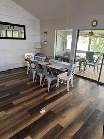 2nd floor dining/living room leading to balcony