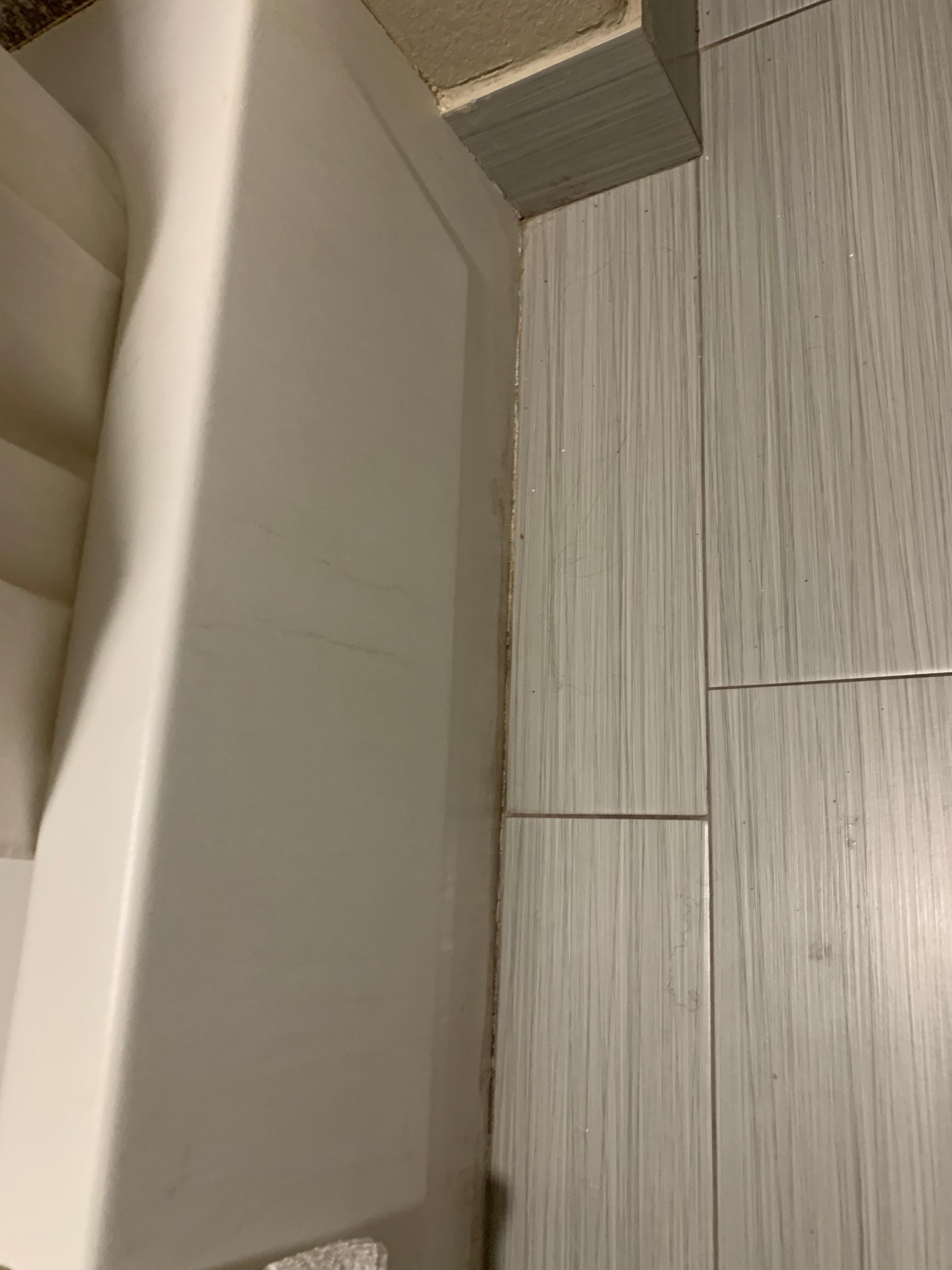 Side of the tub n floor dirty