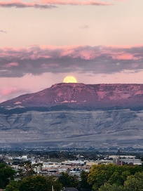 Harvest Moon rising over the Grand Mesa from the deck.