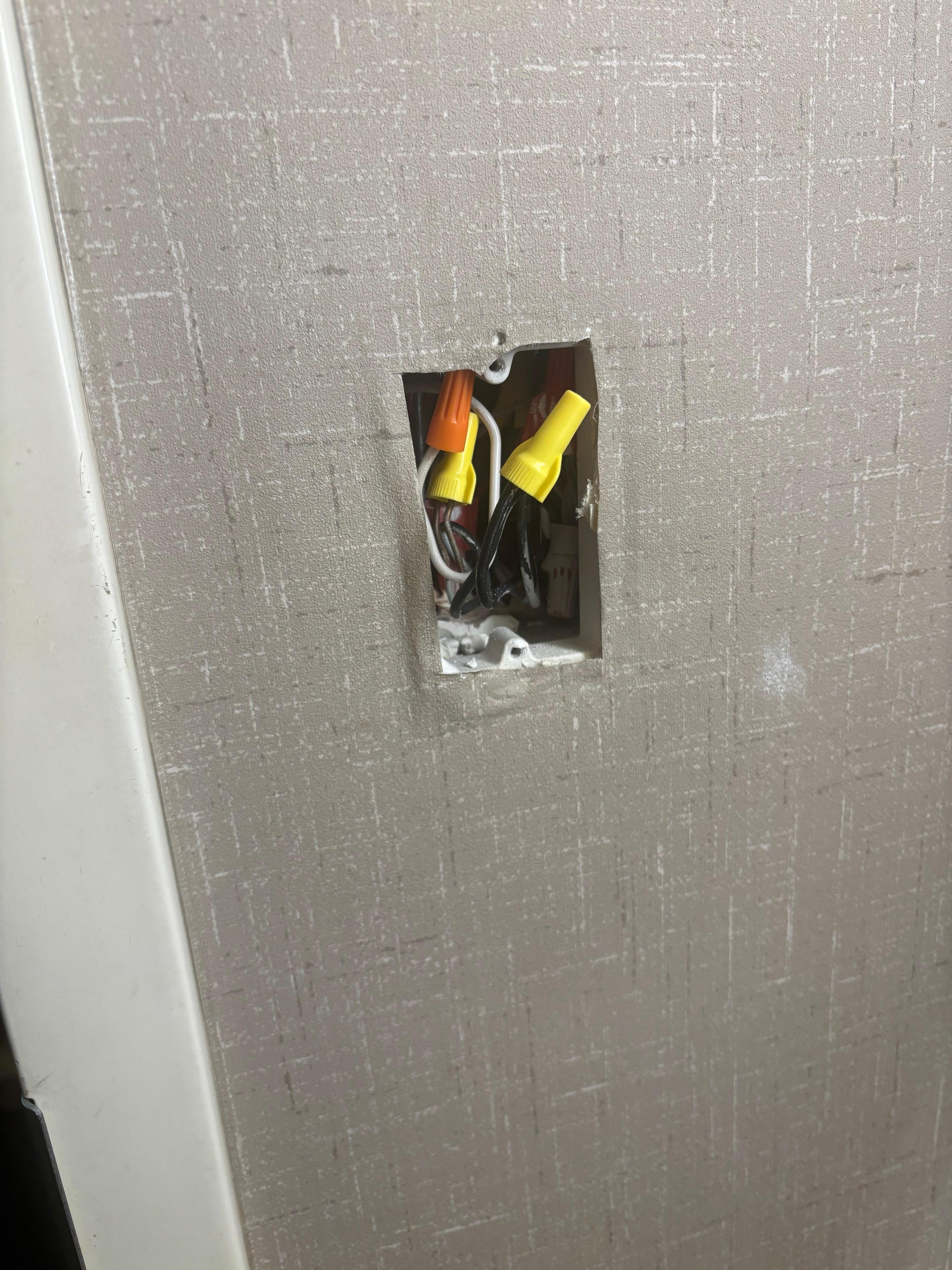 The light switch in the bathroom.