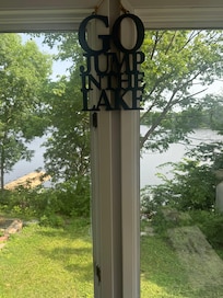 Torturous ironic sign telling us to “Go jump in the lake!” If only we could have!