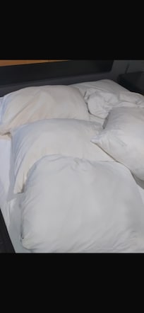 Pillows suppose to be White but they were BROWN with massive stains.