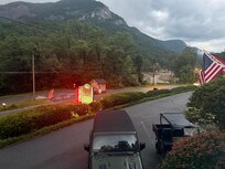 If you will notice the bear that just happened across the road when I was taking a picture of the mountain