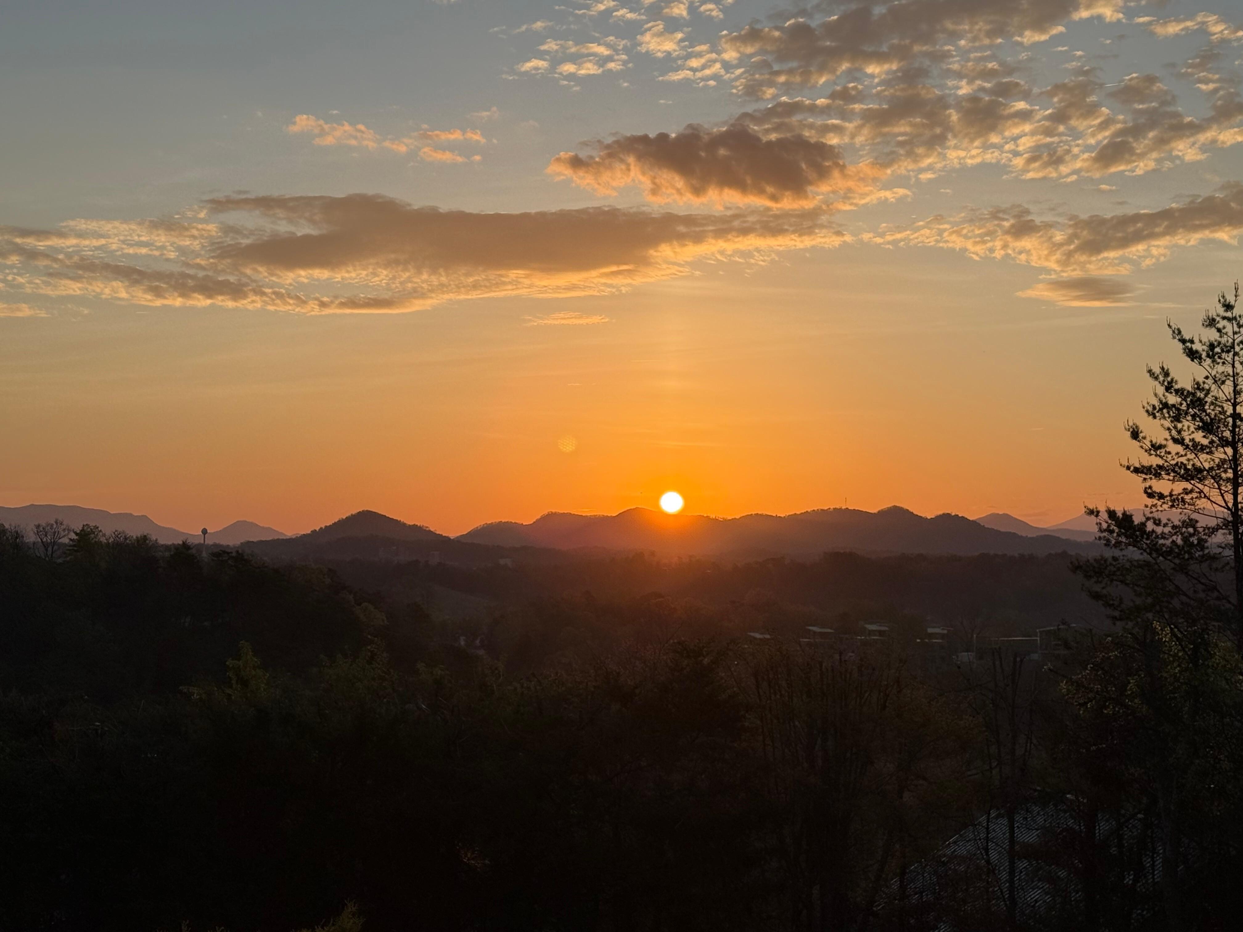 Sunrise with a cup of coffee in hand