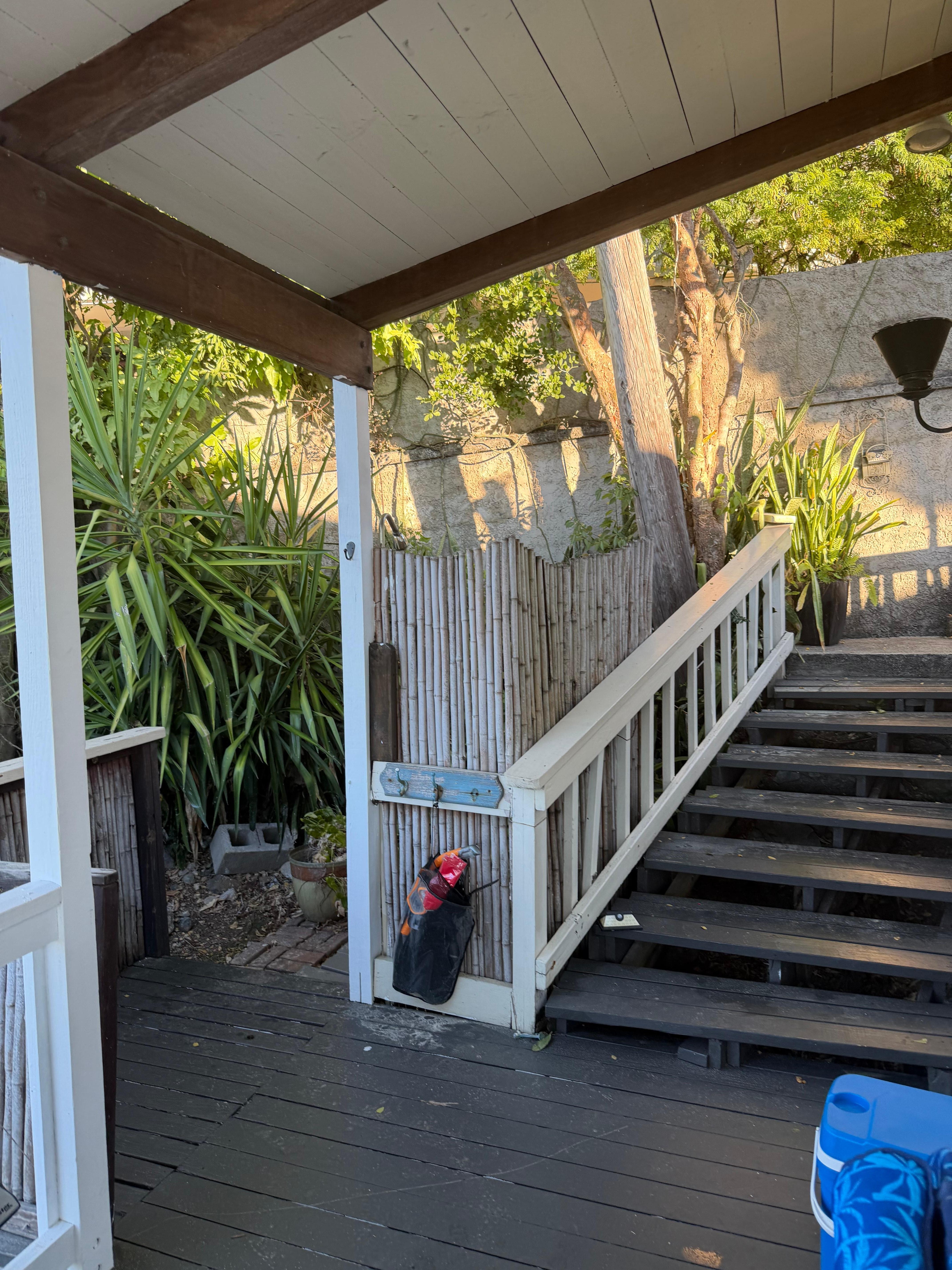 Steps down from street. 