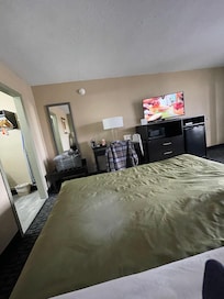 Bed was comfy but not centered on wall with tv. Furniture needs replacing