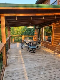 The ceiling fan above the outdoor table added a cool breeze for those hot days.
