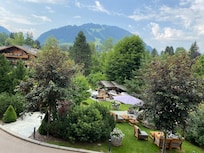 Hotel’s garden restaurant and outdoors pool