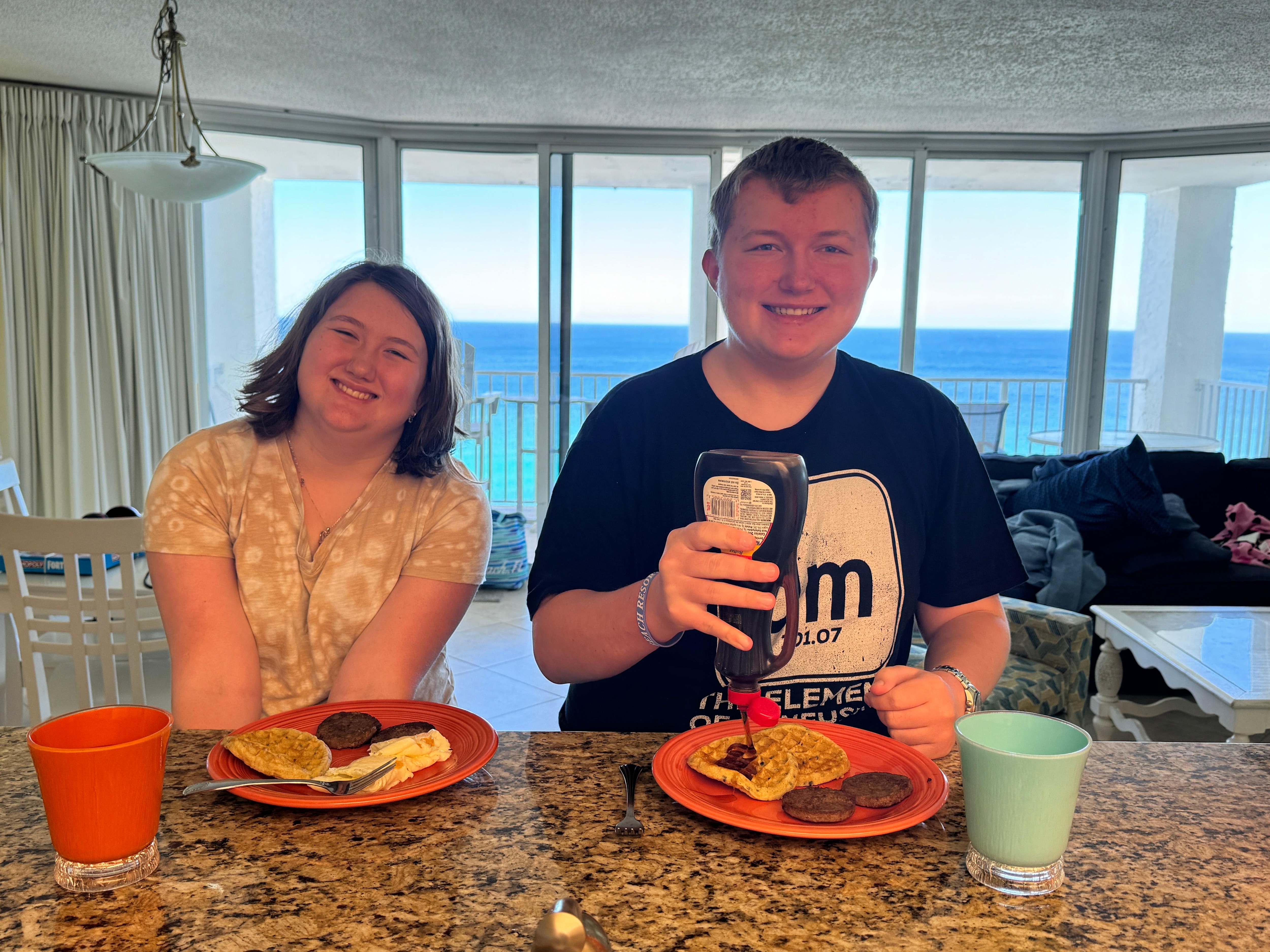 Kiddos having breakfast at the bar.