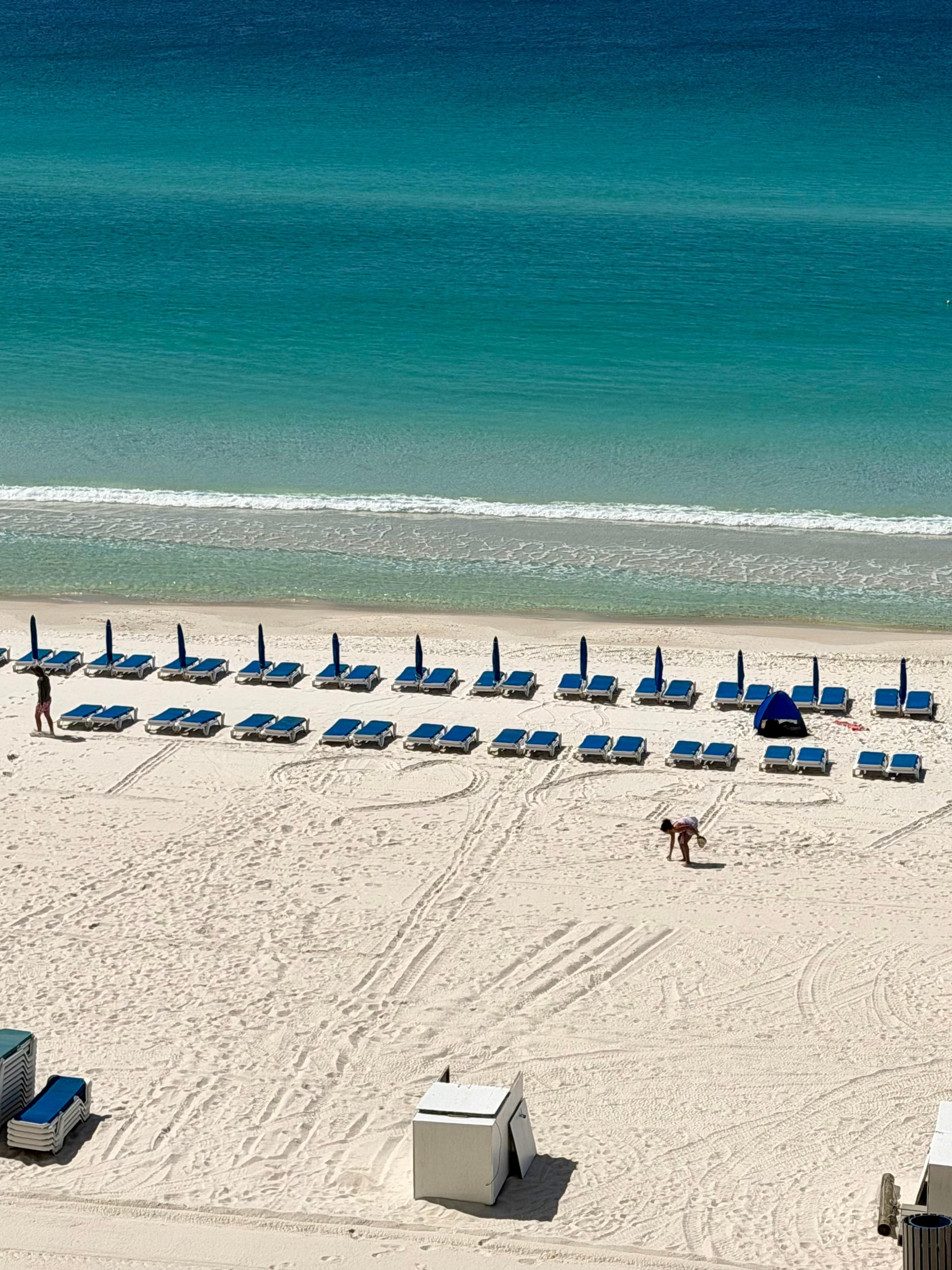 Beach chairs in front of condo
