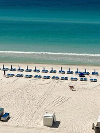 Beach chairs in front of condo