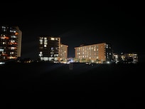 The hotel at night.