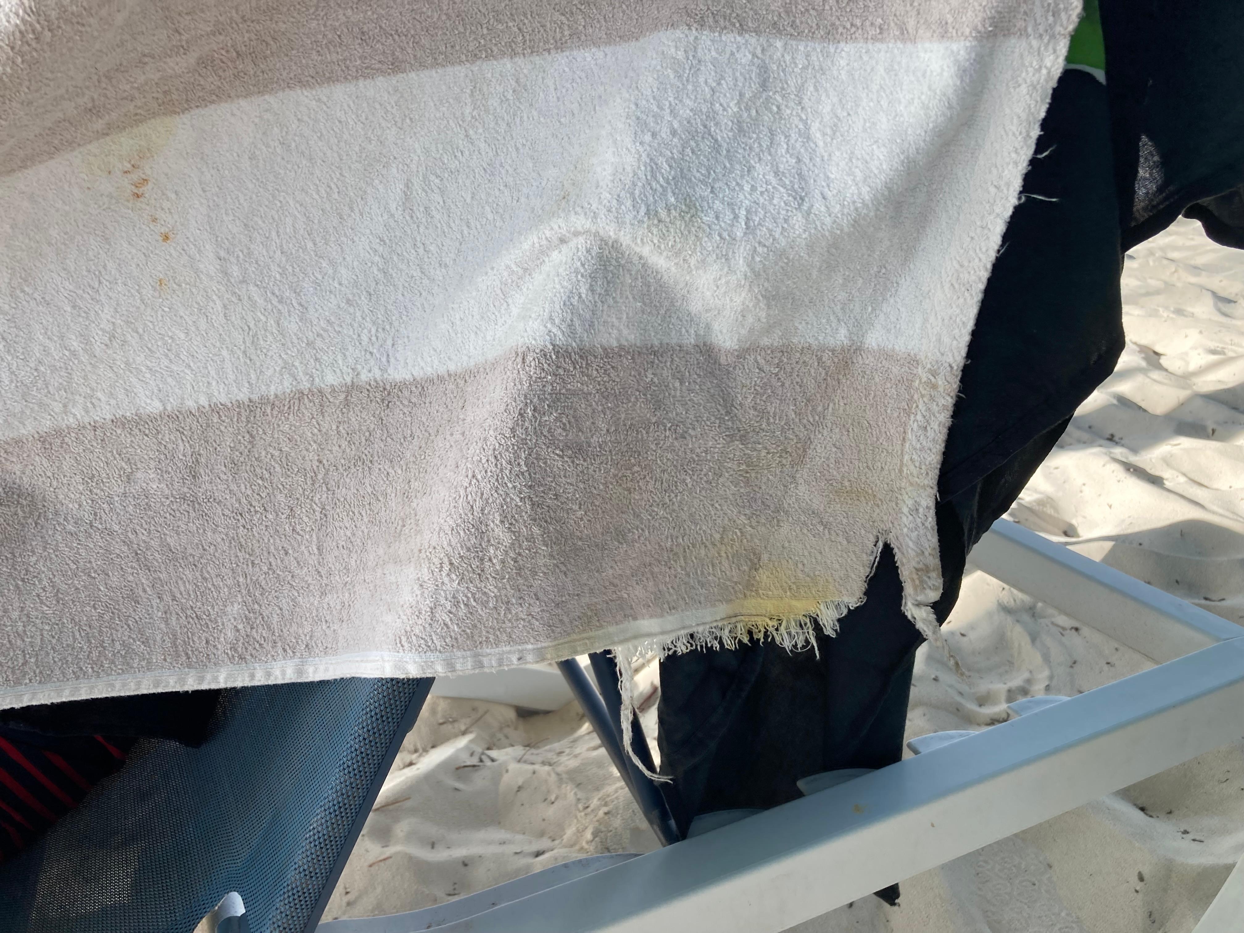 The beach towels, they provide have large holes in them with stains!