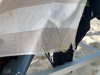 The beach towels, they provide have large holes in them with stains!