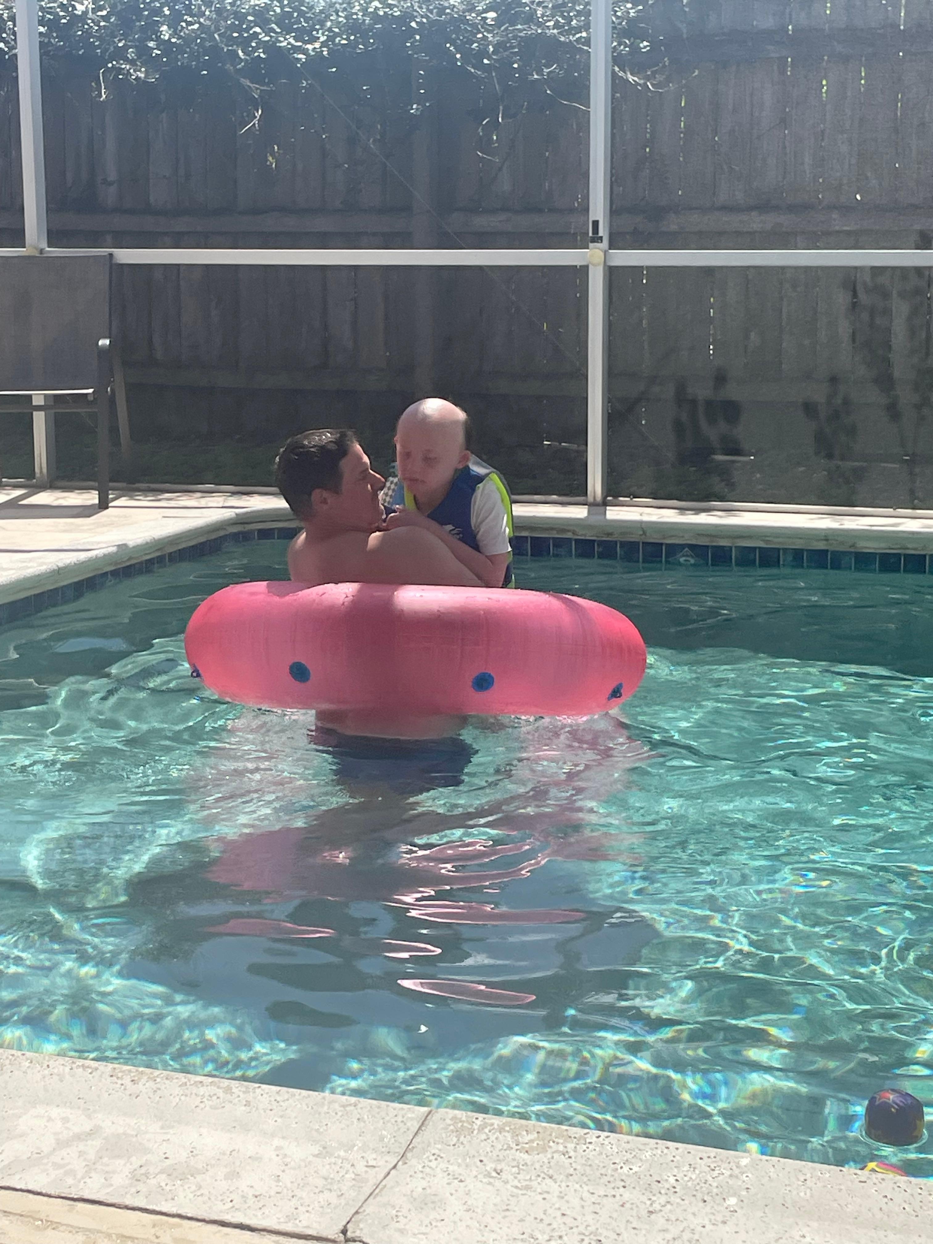 Fun pool time with dad