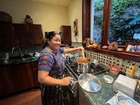 Our personal chef preparing our dinner!!