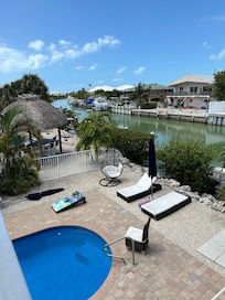 From the patio overlooking the pool and canal.