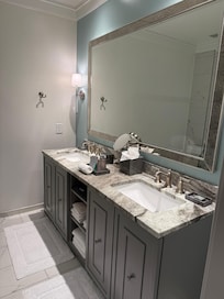 Beautiful bathroom with double sinks and walk-in shower