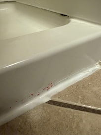 Blood found on right side bottom of bathtub