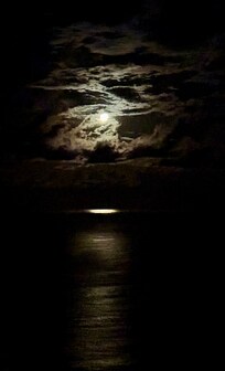 Almost full moon the glow in the sky and on the water was awesome.