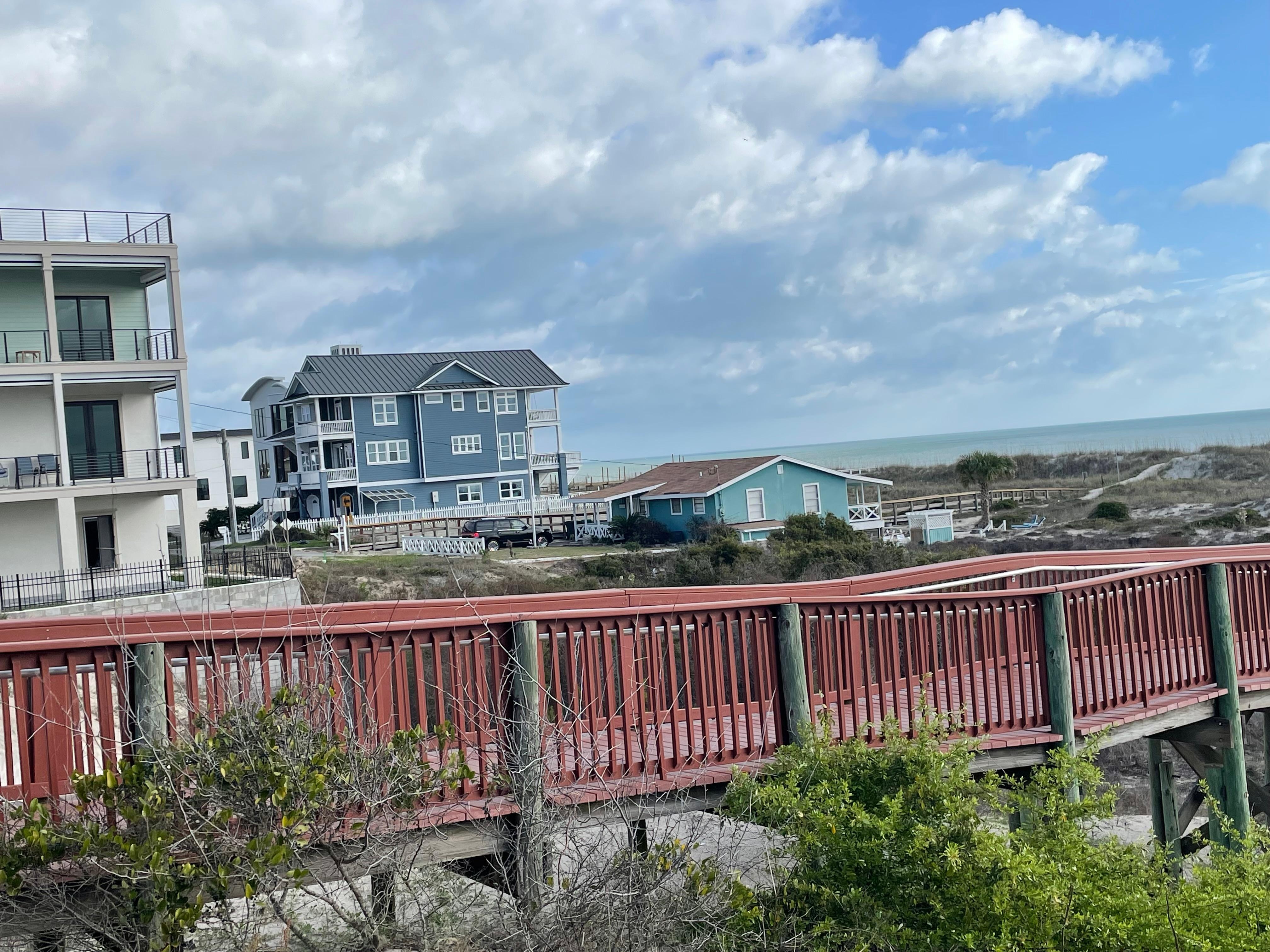 Wooden walkways yo the brachto the