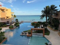 Beautiful view from condo patio but no beach as show in listing photos.