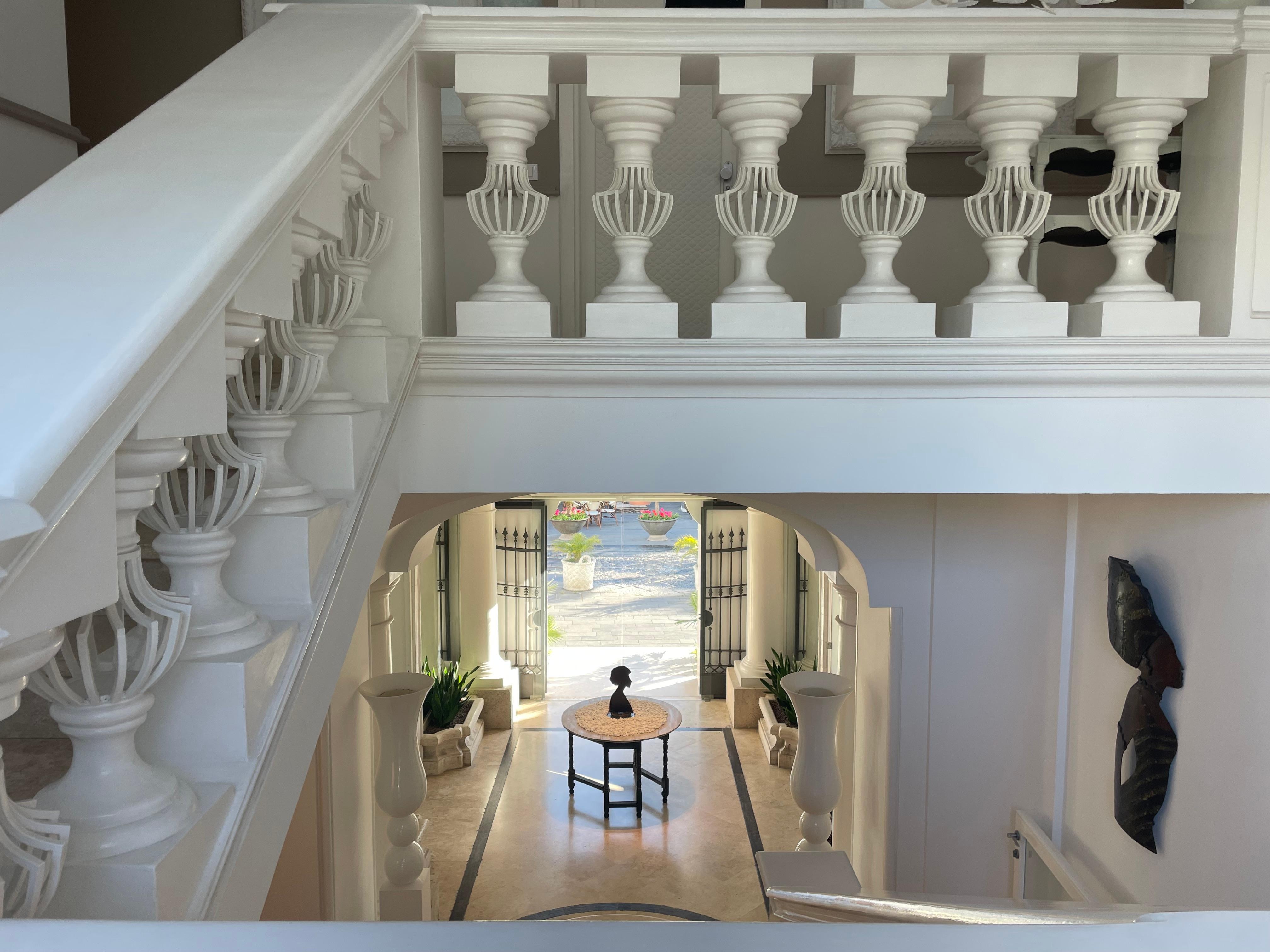 Looking out to the street full of bars and shops.