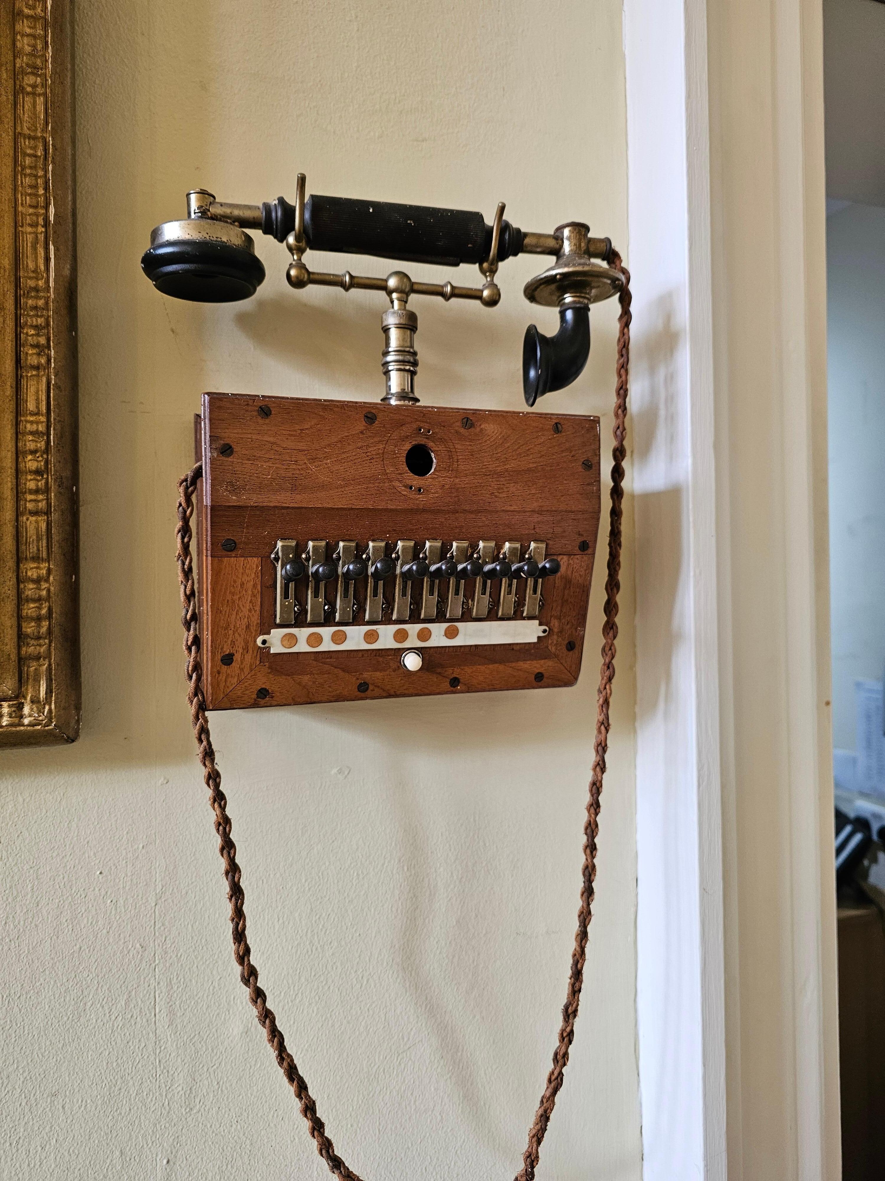 No longer working but hanging next to the reception desk 