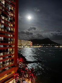 The moon and Diamond Head, Waikiki waters from our room's balcony.