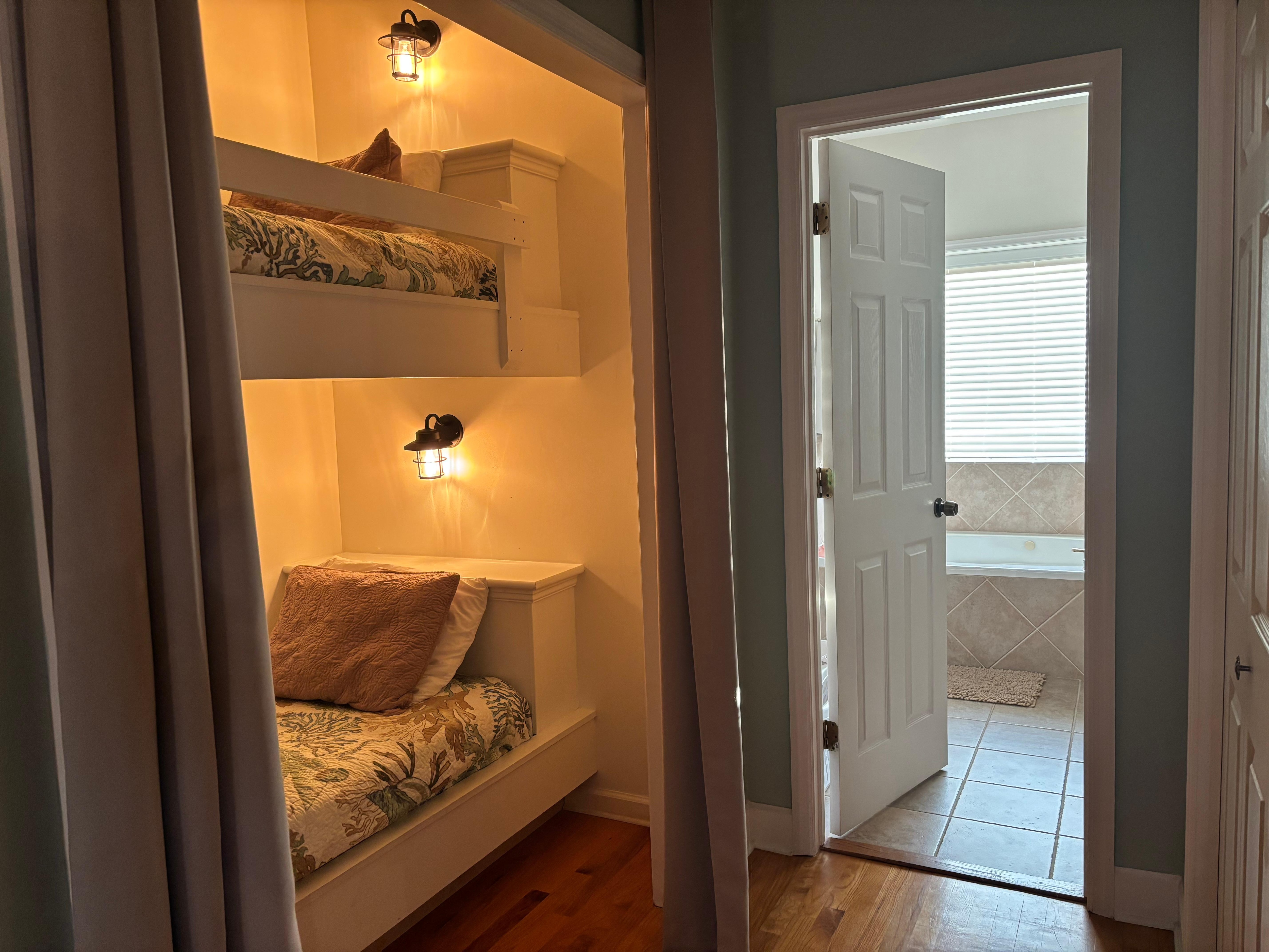 Twin bunks nestled within the master bedroom. Perfect for our younger daughter.