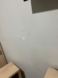 Screws and dirty marks in the bedroom