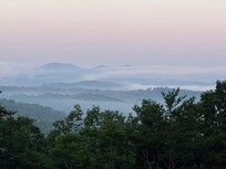 Clouds over the mountains at sunrise