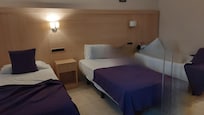 Room 405 with 3 beds