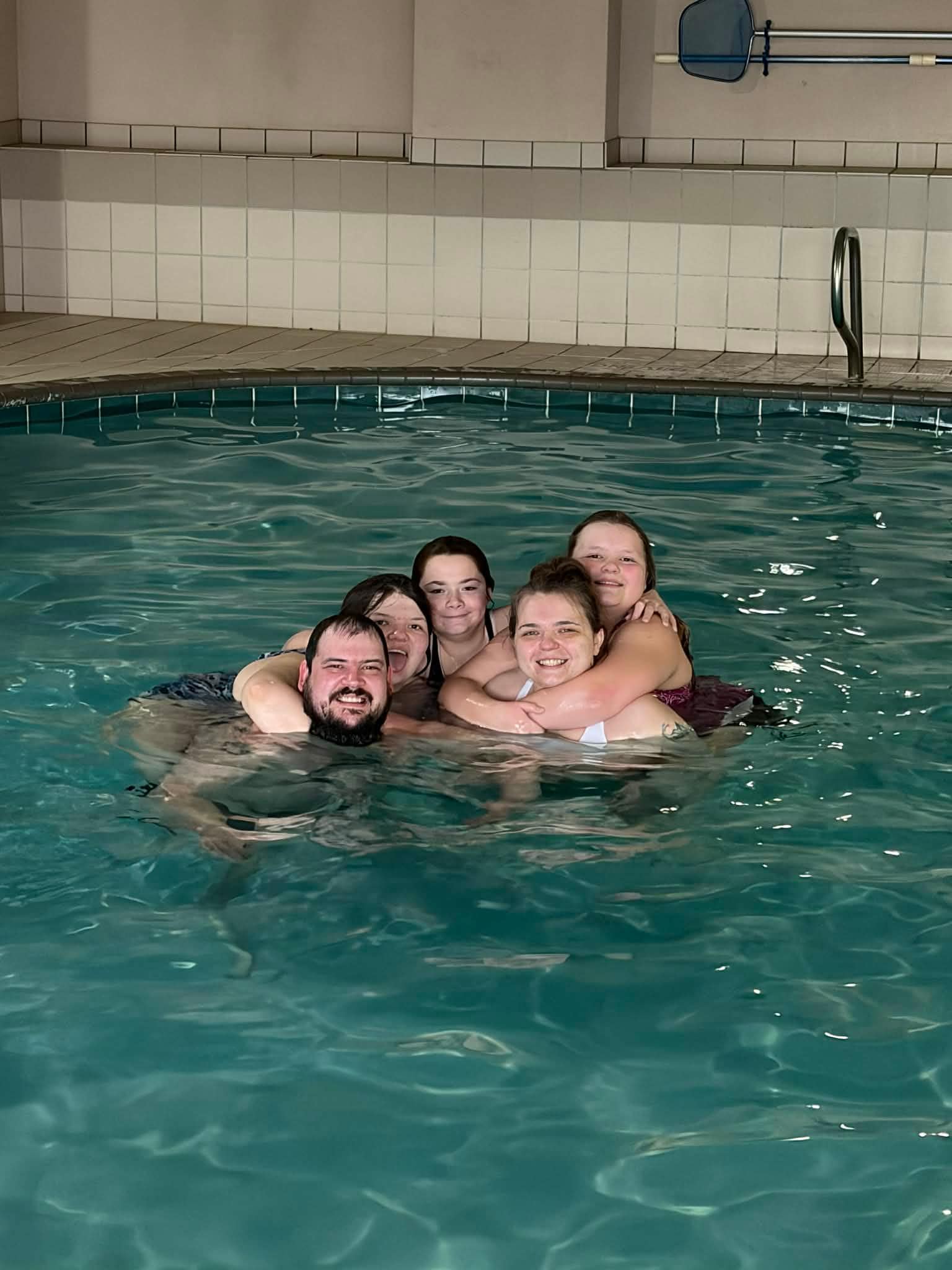 My family and I in their pool having a blast!