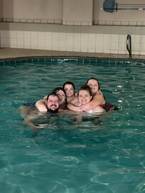 My family and I in their pool having a blast!