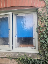 Windows dirty and had old tape around them
