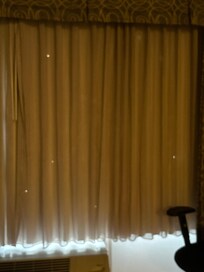 Small holes all over the curtains