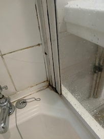mould in corner of bath