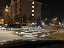 Parking lot conditions WEEKS after a snow storm.