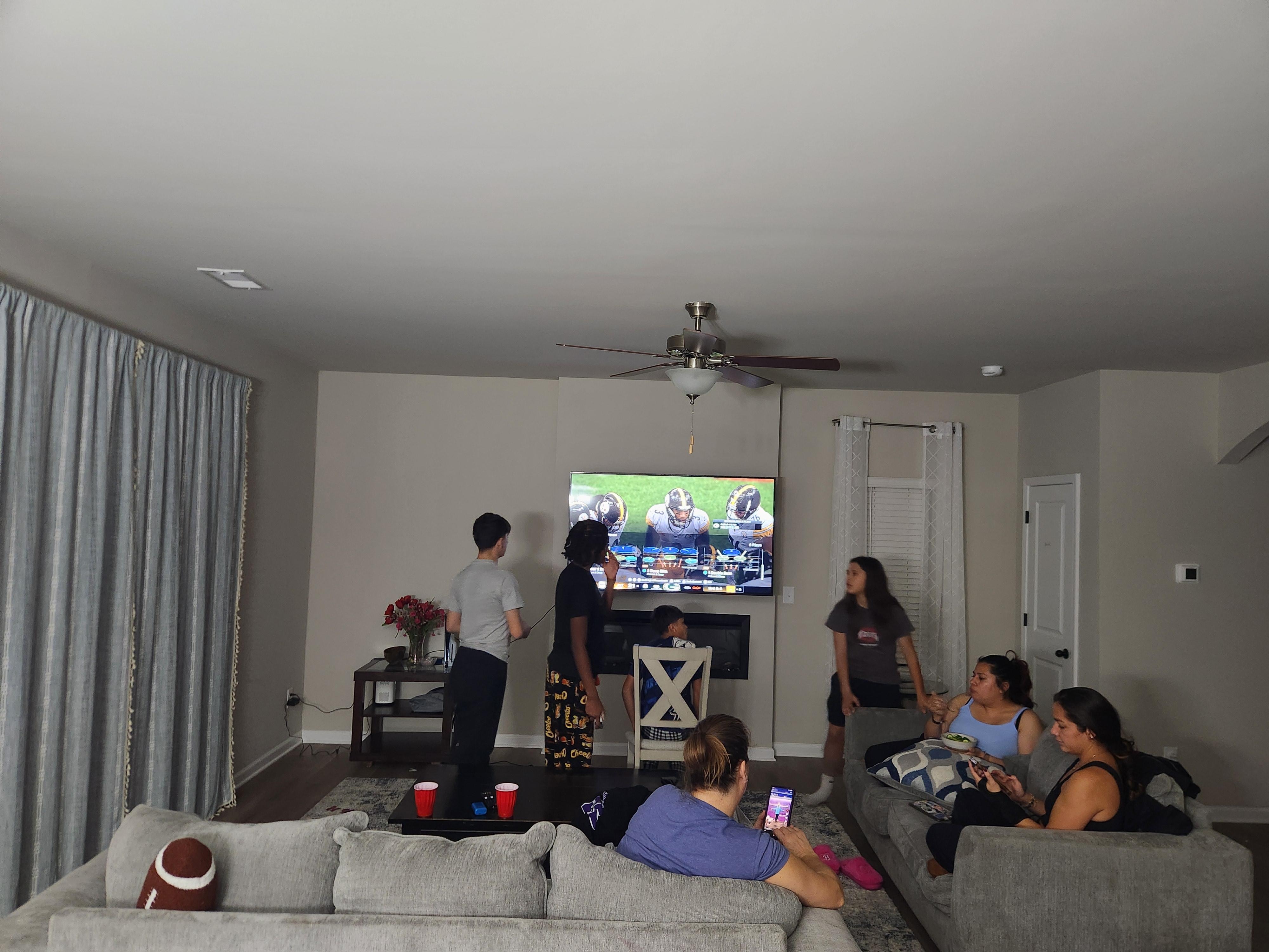 Enjoying some downtime. The boys playing PS5 while the moms hang out.