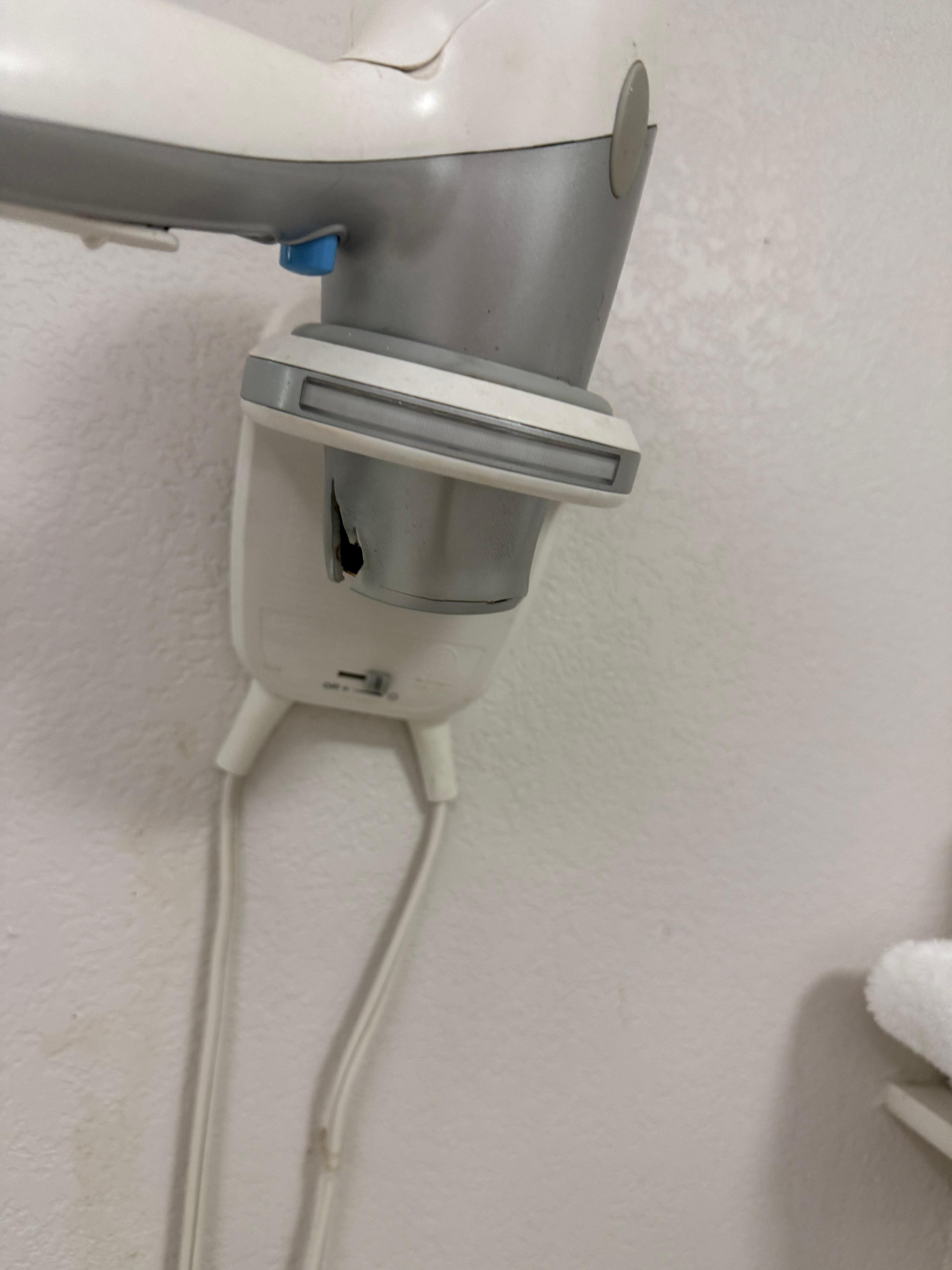 Melted Hair dyer that was there for guests.