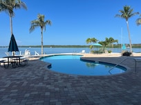 Beautiful pool area and grills in the common area.