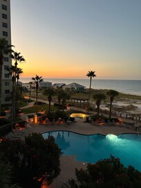 Pool view from patio at sunset