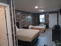 The smaller bed is an air mattress....