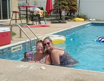 Daughters enjoying the pool