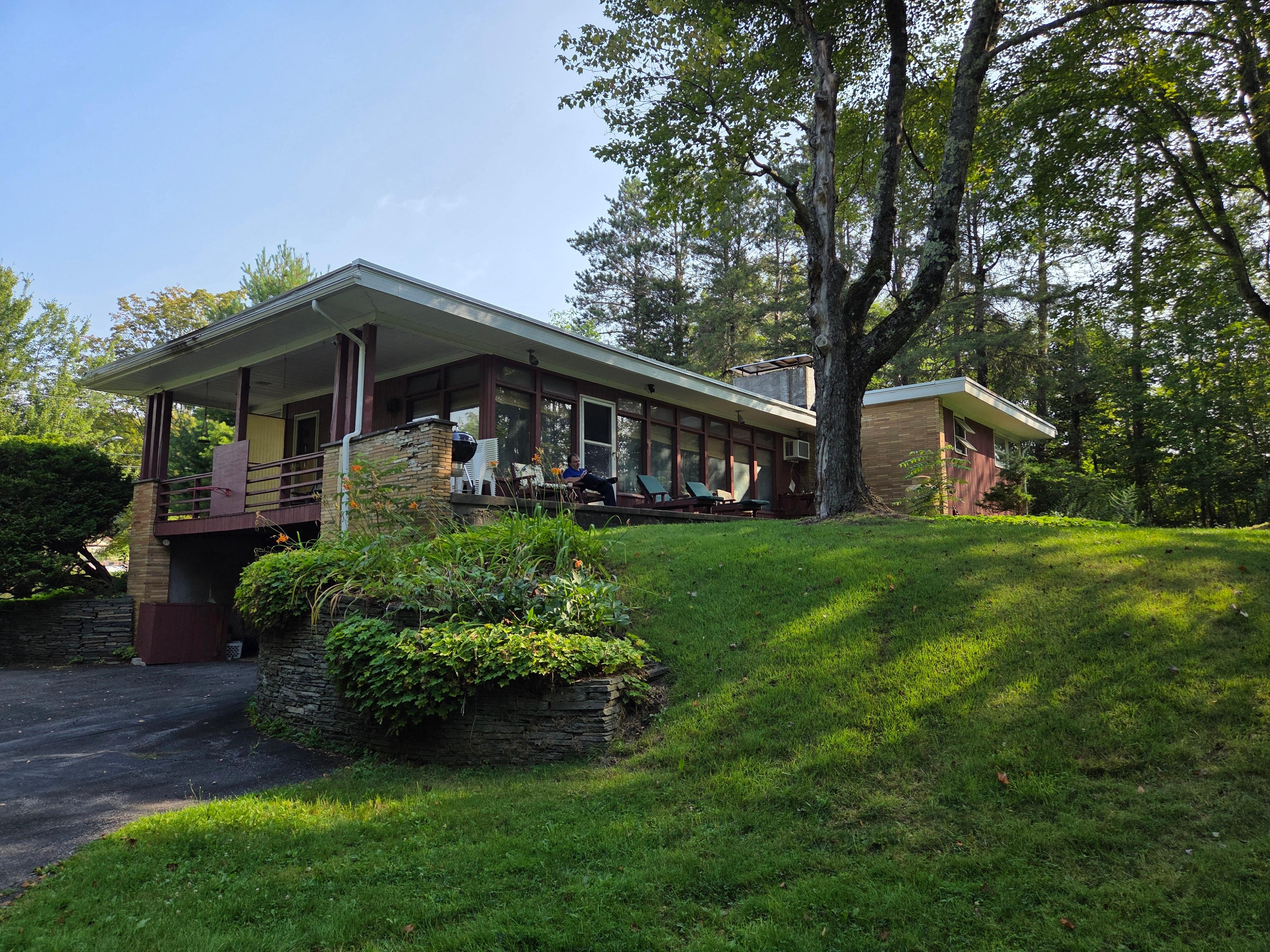 The back of the house seen from the driveway.  